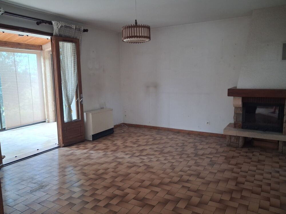 L'ESCALE  Maison individuelle avec véranda, garage et jardin arboré