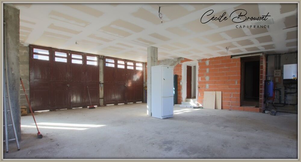 Villa 4 faces à vendre sur 1425 m2 de terrain avec garage et studio indépendant à REYNES (66)