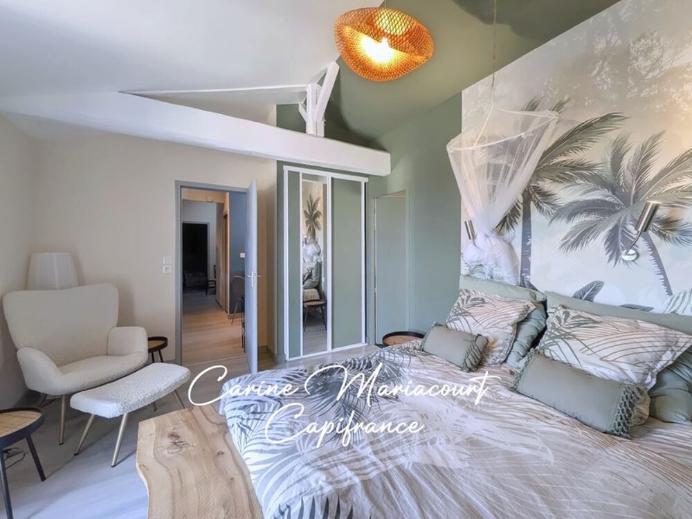 Maison de caractère de 226 m2, DPE B, 4 suites parentales, 2 garages, grande cave aménageable