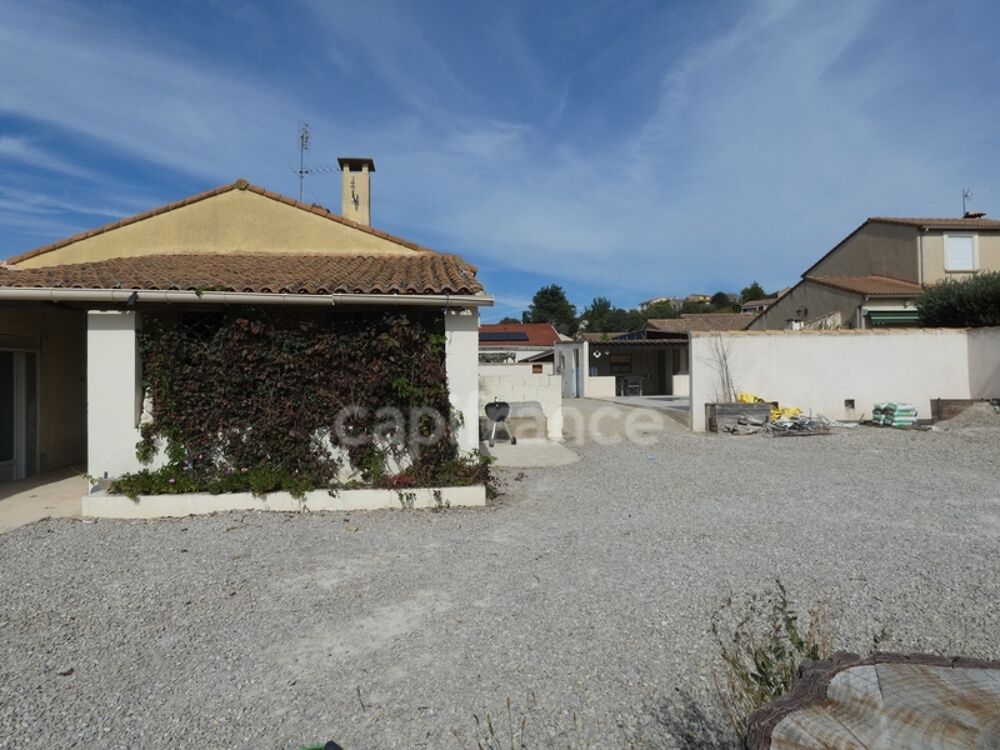 Maison de 93 m² climatisée avec piscine et dépendance de 50 m² sur la commune de SAINT GILLES (30)