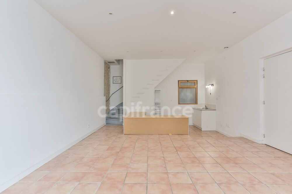 Terrasse en toiture & grand garage : une maison de village rare proche dUzès