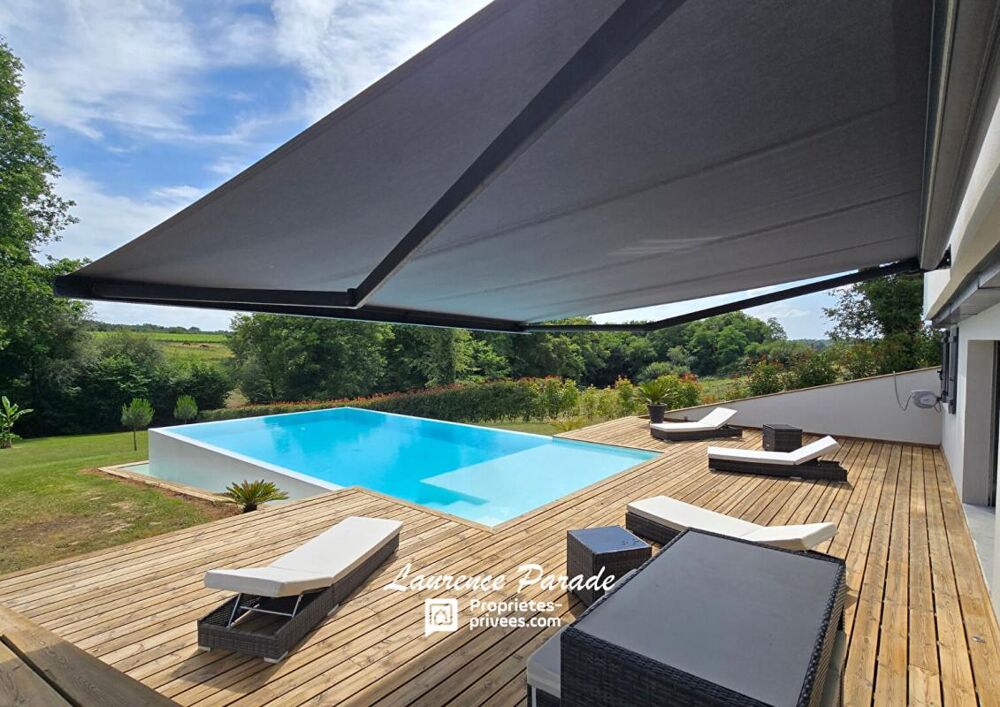 Maison avec sous sol annexe piscine parc