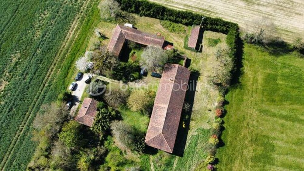 2 maisons d'habitation, dépendances, 1ha de terrain