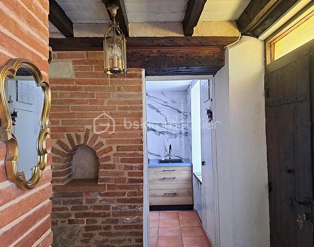 Maison de village avec jardin, piscine et garage attenant