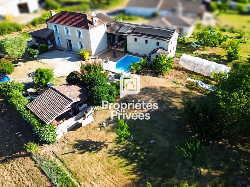 Maison en pierre de 185 m² avec piscine, dépendance et parc arboré à 10 min de Marmande
