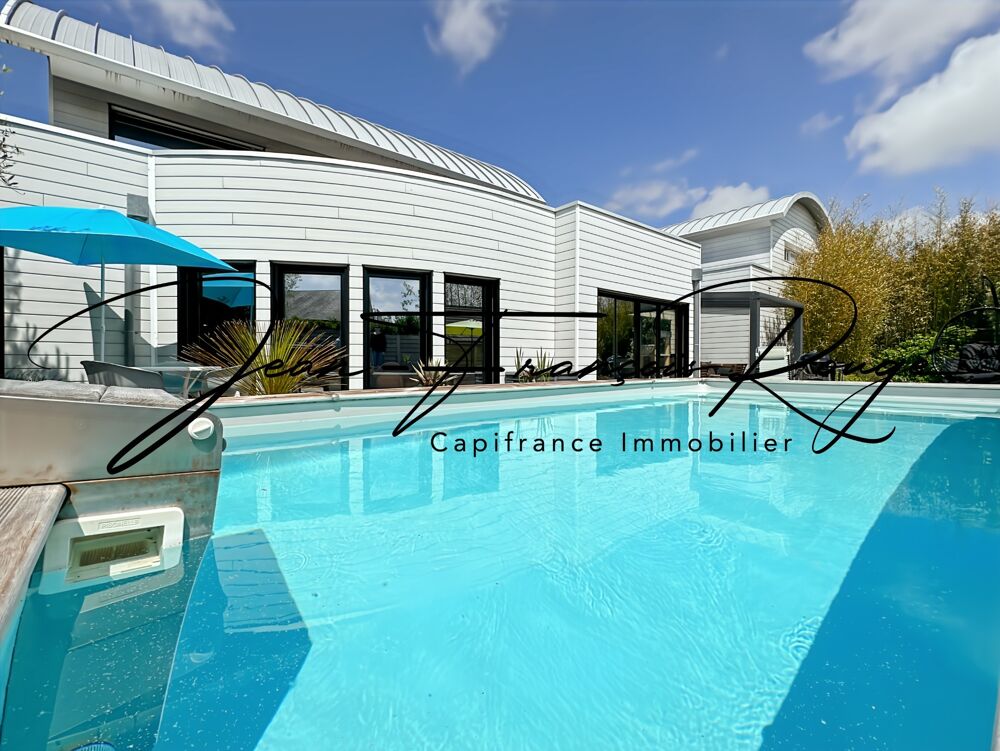 AGON-COUTAINVILLE, à 600 mètres de la plage, superbe maison d'architecte construite en 2007 d'une surface de 320 m², avec piscin