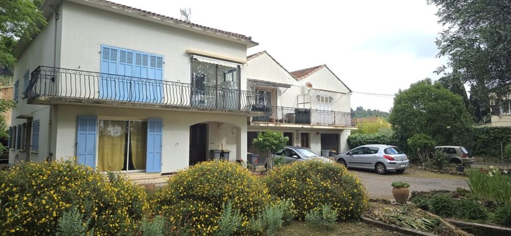 Ensemble immobilier T11 de 279 m2 avec garage, caves et hangar sur 816 m2 de terrain