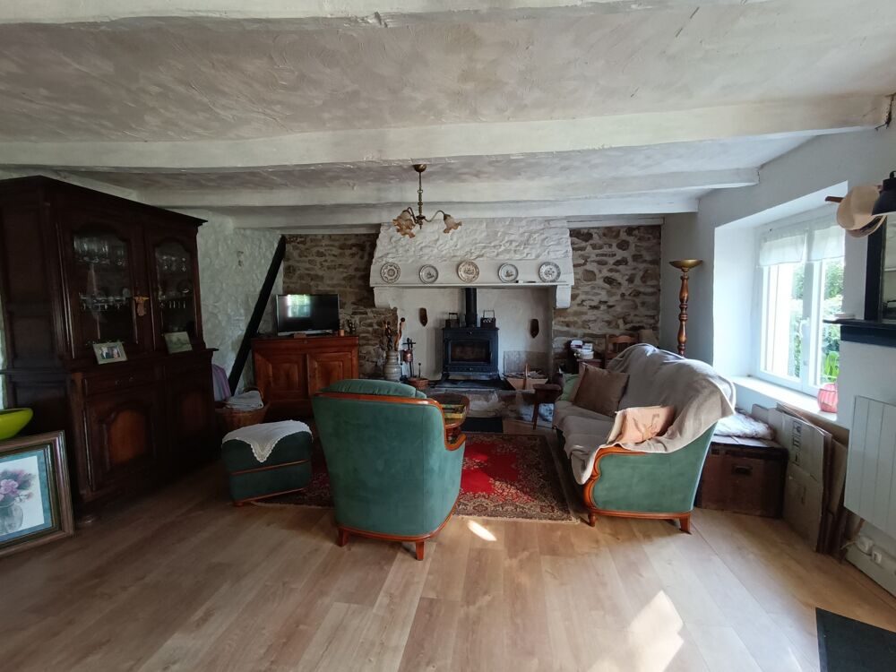 Vente Maison Maison en pierre 94 m² avec jardin arboré de 952 m², dépendances et serre – 3 chambres Roudouallec