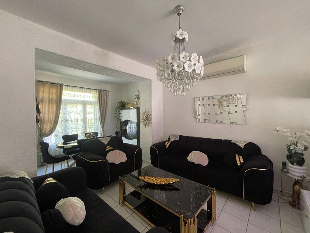 A vendre maison mitoyenne 3 pièces de 65 m2 avec grand garage sur terrain de 295 m2