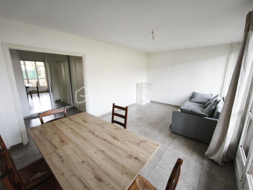 Appartement 3 pièces de 65m² avec balcon, parking et cave