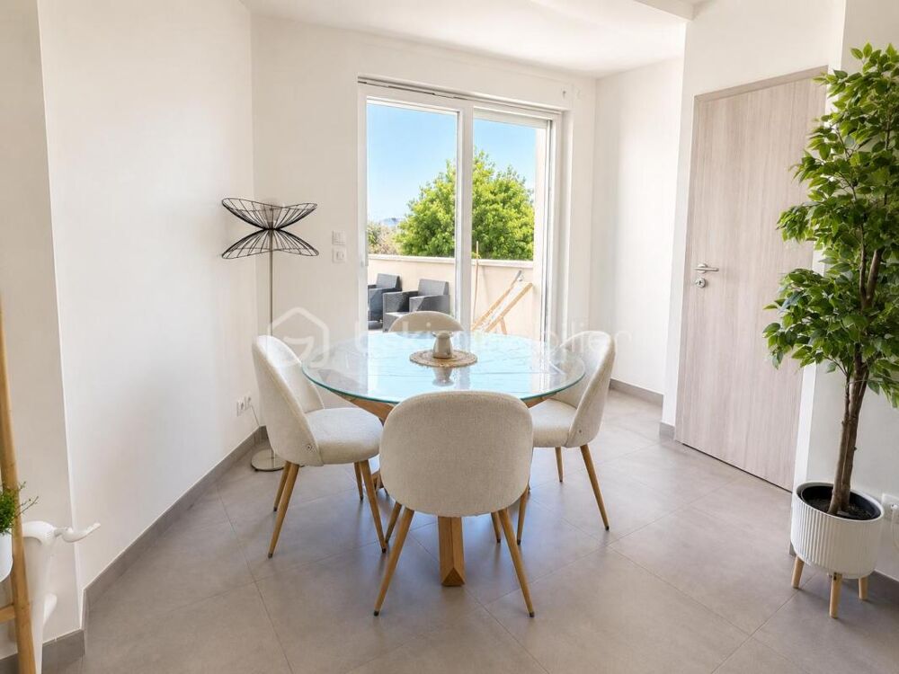 Appartement 3 pièces de 64 m² avec terrasse et box en sous-sol  Résidence récente de 2021
