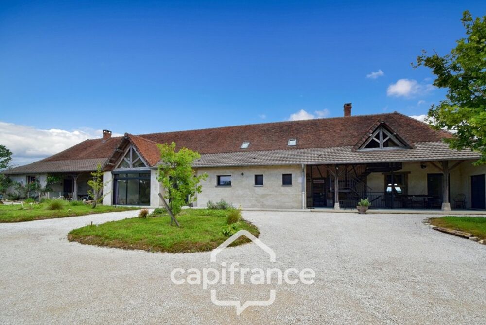 Propriété avec gîtes et chambres dhôtes dans dépendances séparées et Maison bressane rénovée de 140 m²  Terrain 4374 m² LOUHA