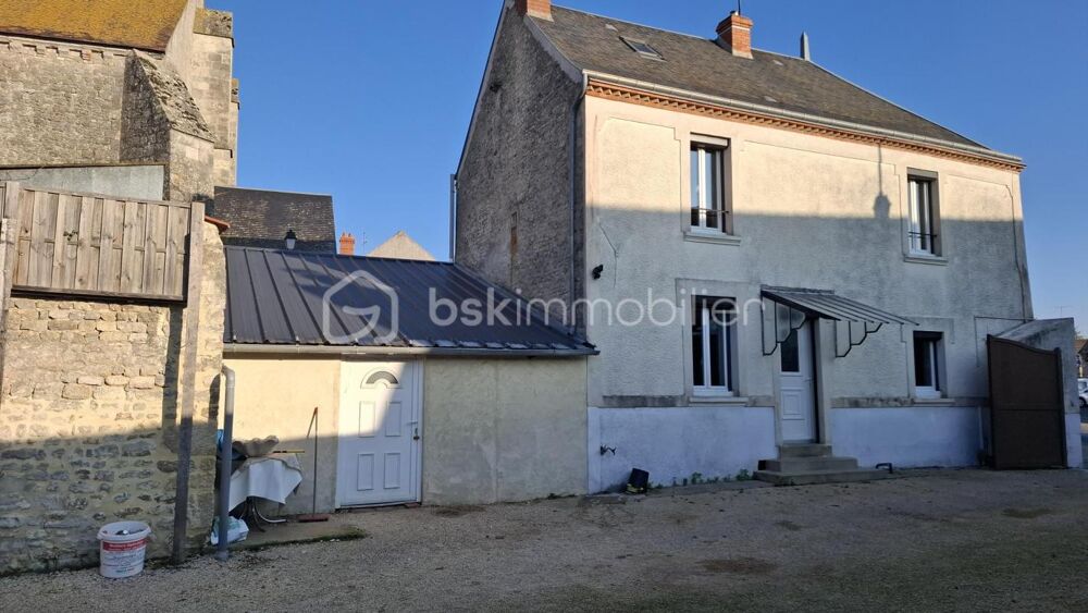 Corps de ferme en plein centre ville