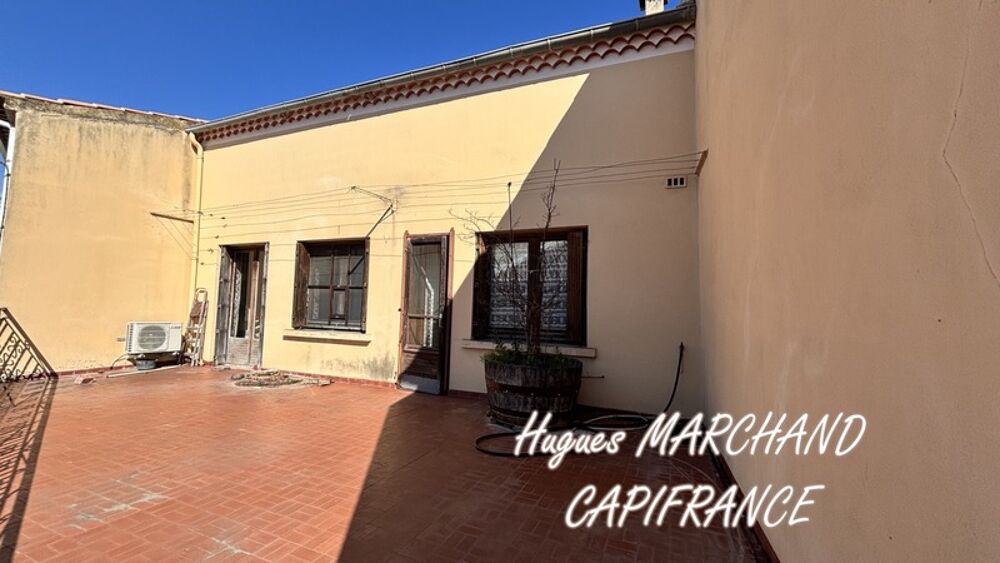 LESPIGNAN - Maison de village avec jardin et grand garage  Fort potentiel !