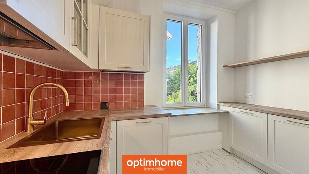 Appartement de charme rénové avec balcon, cave et faible charges  75 m²  Lumineux & élégant