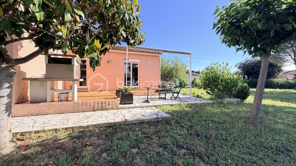 MAISON QUATRES FACES AVEC GRAND TERRAIN ET GARAGE