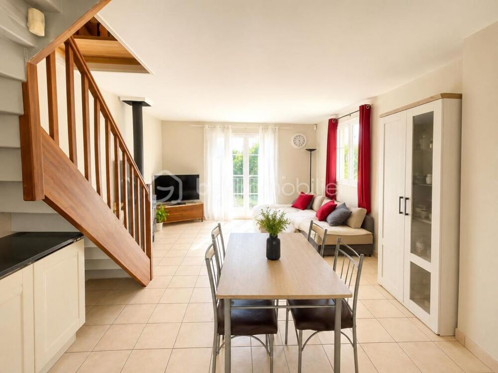 MAISON idéalement située avec beau jardin et grand garage indépendant