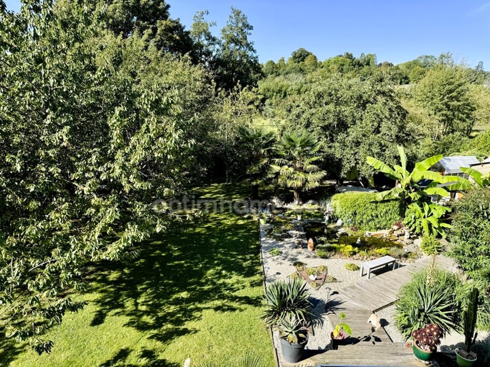 Maison bourgeoise 6 chambres  216 m²  Jardin arboré, garage et prestations de qualité