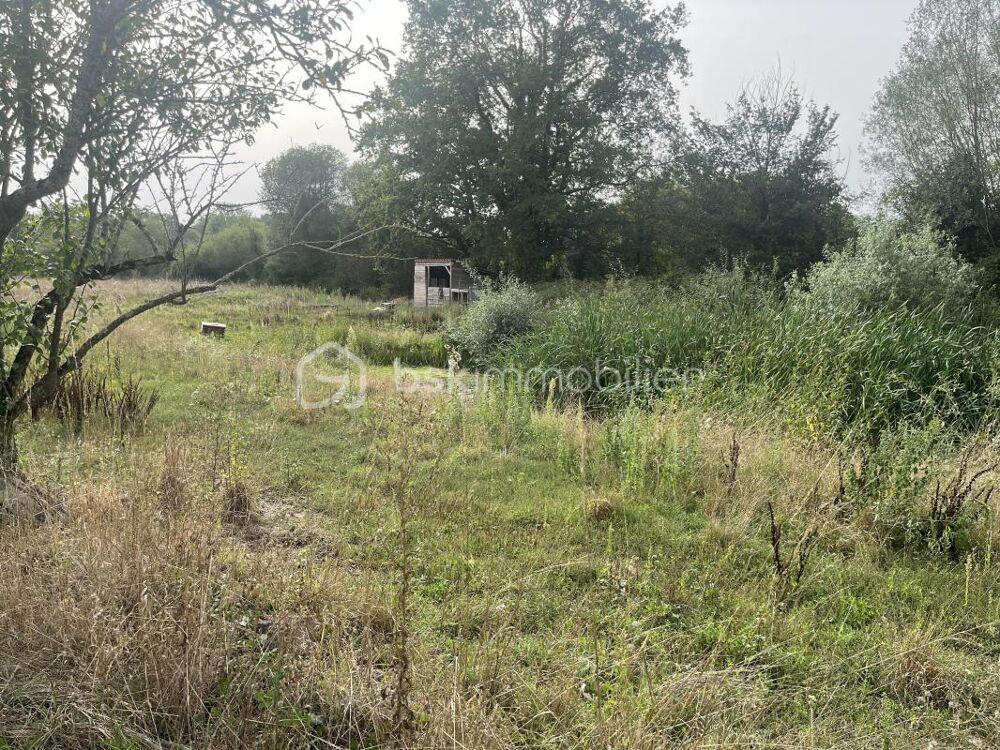 Vente Terrain TERRAIN DE 7084 M2 DONT 600M2 CONSTRUCTIBLE AVEC UN PLAN D'EAU Nueil les aubiers