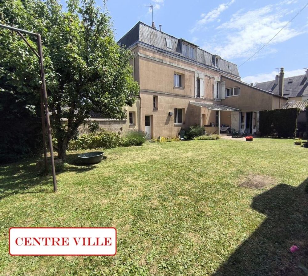 Maisons centre ville, garages et jardin