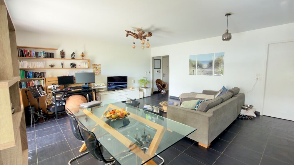 Vente Appartement Port Marianne – T3 traversant 76 m² – Terrasse Sud 27 m² – DPE A – Parking Montpellier