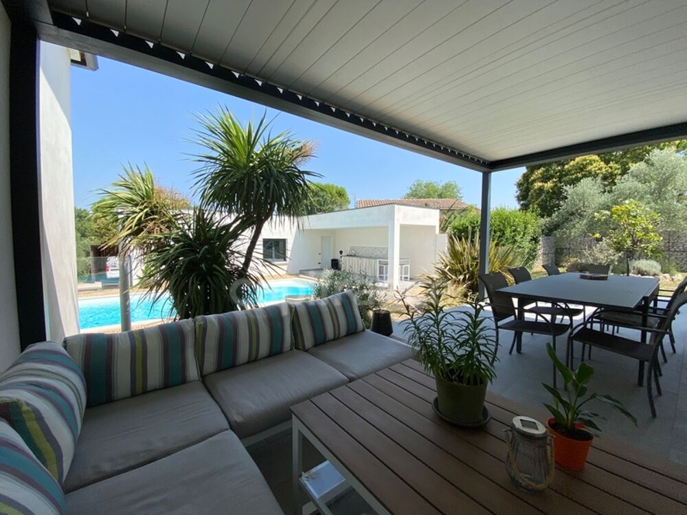 Vente Maison Proche de Nîmes, Maison à vendre 4 pièces de 115 m2, double garage, carport, piscine Nimes