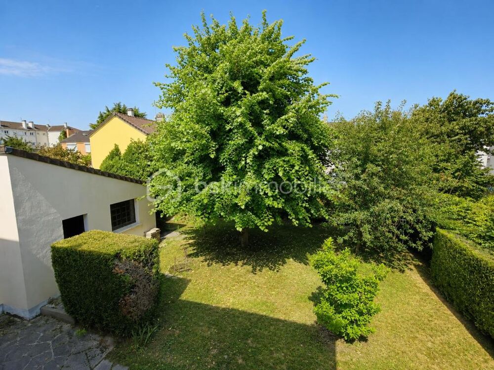 Maison familiale 4 chambres avec garage, dépendance et cave  Beau potentiel de rénovation