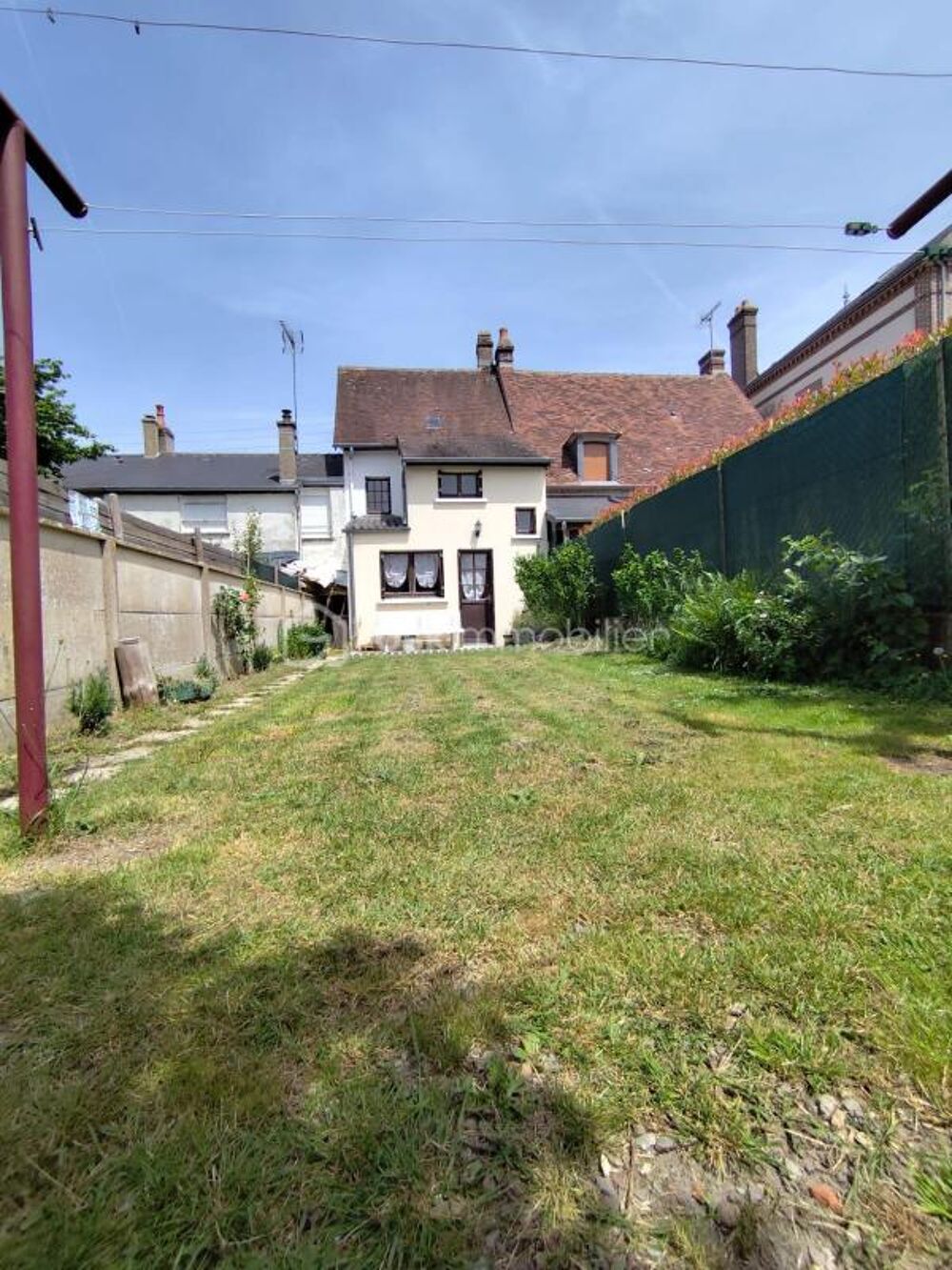 Maison de ville avec jardin - habitable de suite