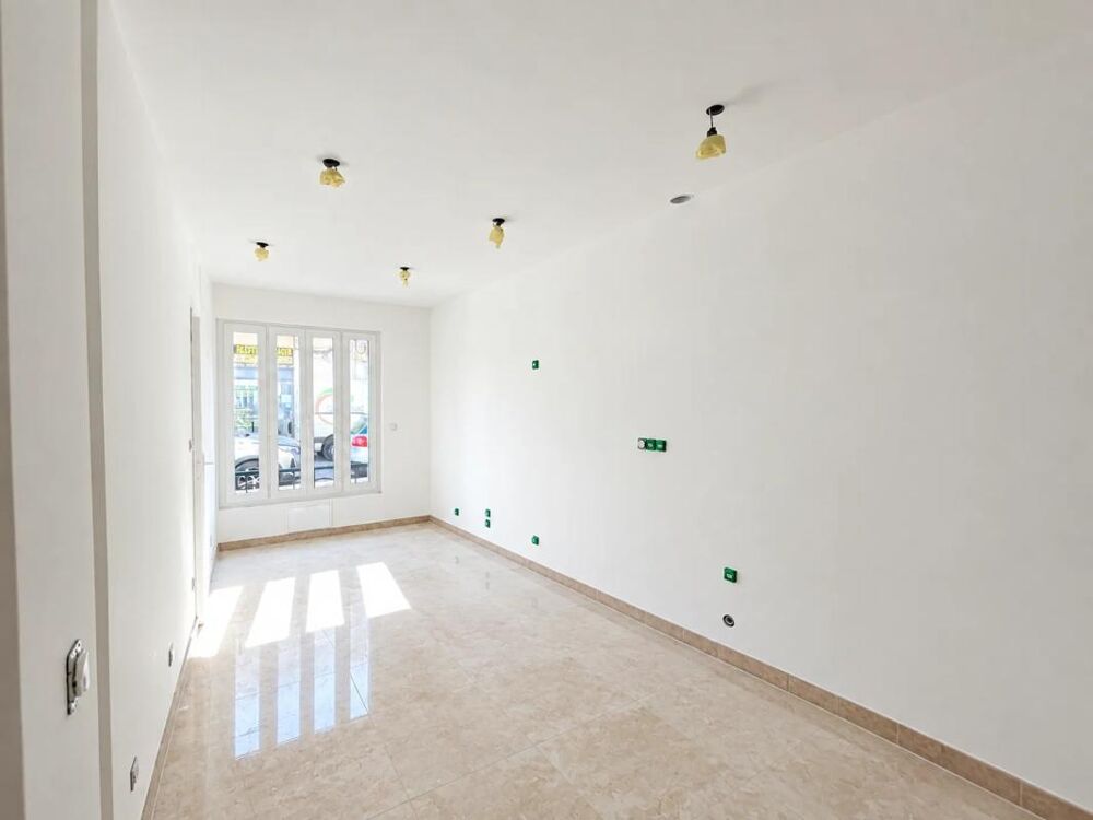 Vente Appartement Maison de ville rénovée avec patio et garage Nimes