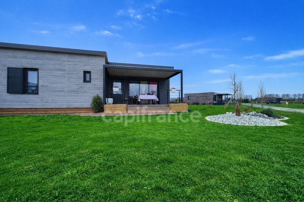 Vente Chalet Maison/Chalet - 3 pièces SAINT ROMAIN DE BENET (17) - Terrain de 333m² Saint romain de benet