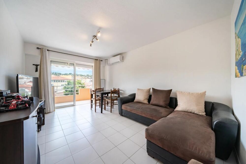 2P TRAVERSANT 44,7 M²  DOUBLE TERRASSE  STATIONNEMENT PRIVATIF