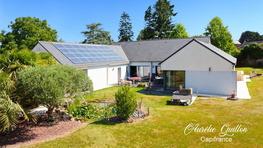Maison darchitecte de plain-pied de 254 m² avec piscine intérieure et terrain de 3000 m² en plein coeur de Ploërmel