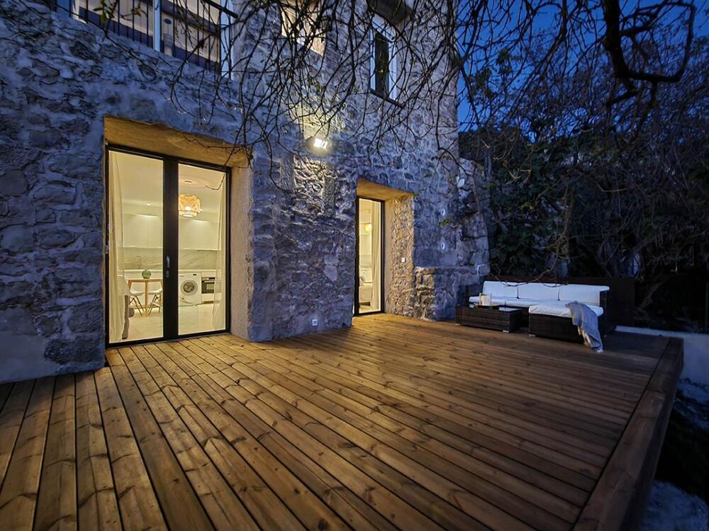 Studio avec terrasse et jardin privatif