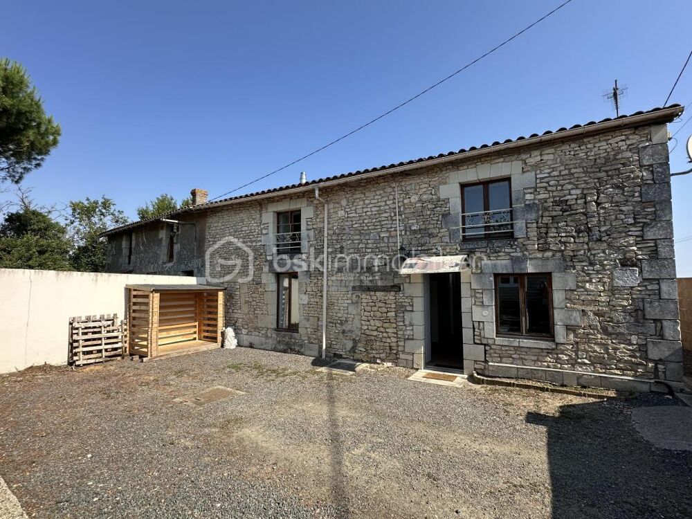 Maison en pierre avec grand garage et jardin clos