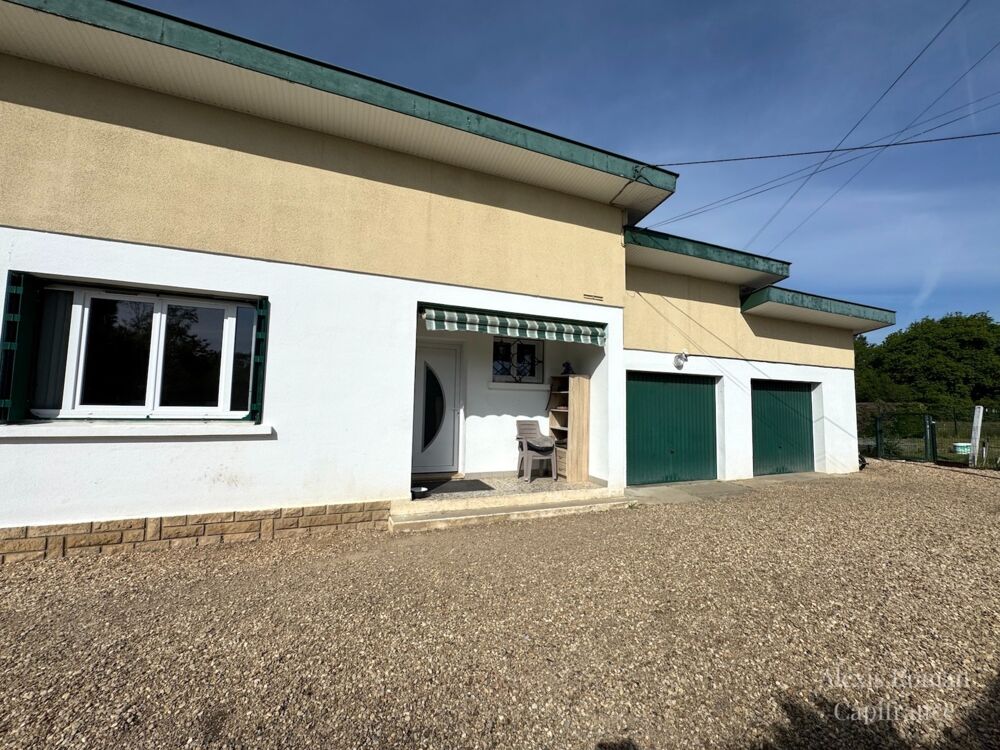 Maison de plain-pied 105 m² + double garage  env. 155 m² utiles  terrain 1 533 m²  proche commodités