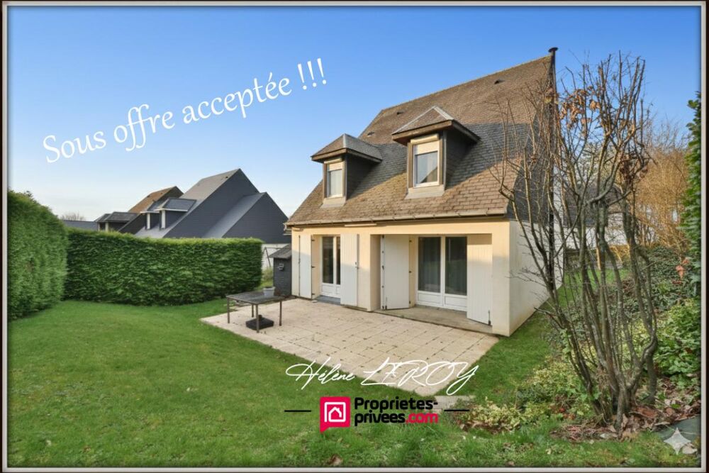 Maison individuelle avec garage et jardin dans quartier calme