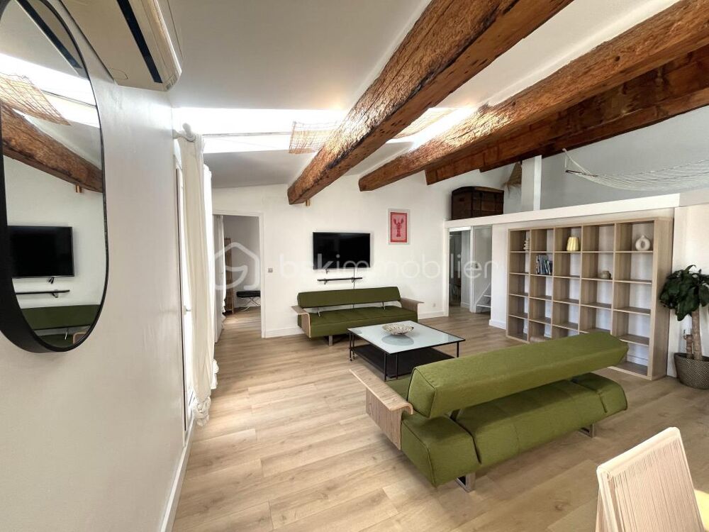Sur les quais de Sète Duplex 4 pièces au dernier étage avec vue canal & charme authentique !