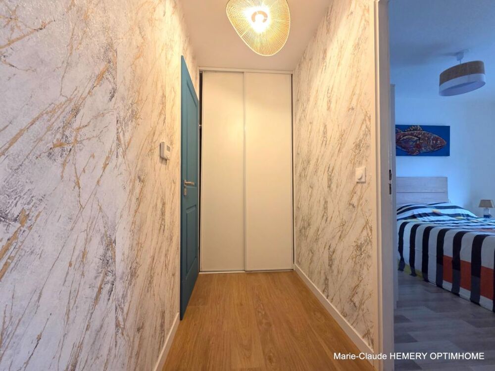 Vente Appartement DINARD – RUE GARDINER :Appartement entièrement rénové avec terrasse plein ouest et parking en sous-sol Dinard