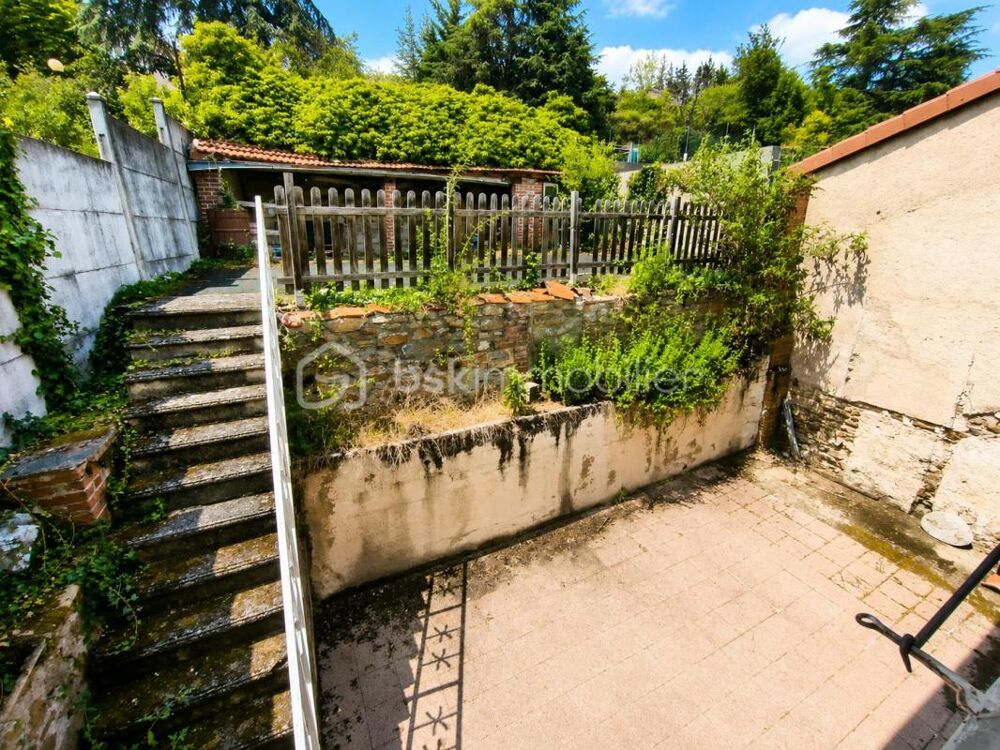 Maison de ville de 167 m² avec garage, 4 chambres et jardin  Un beau projet à façonner selon vos envies !