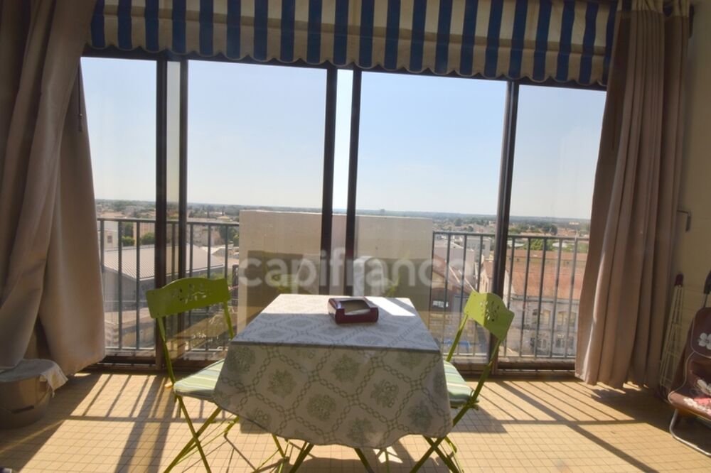 T3 traversant climatisé avec terrasse et cave  Vue dégagée, 7? étage avec ascenseur NIMES (30)