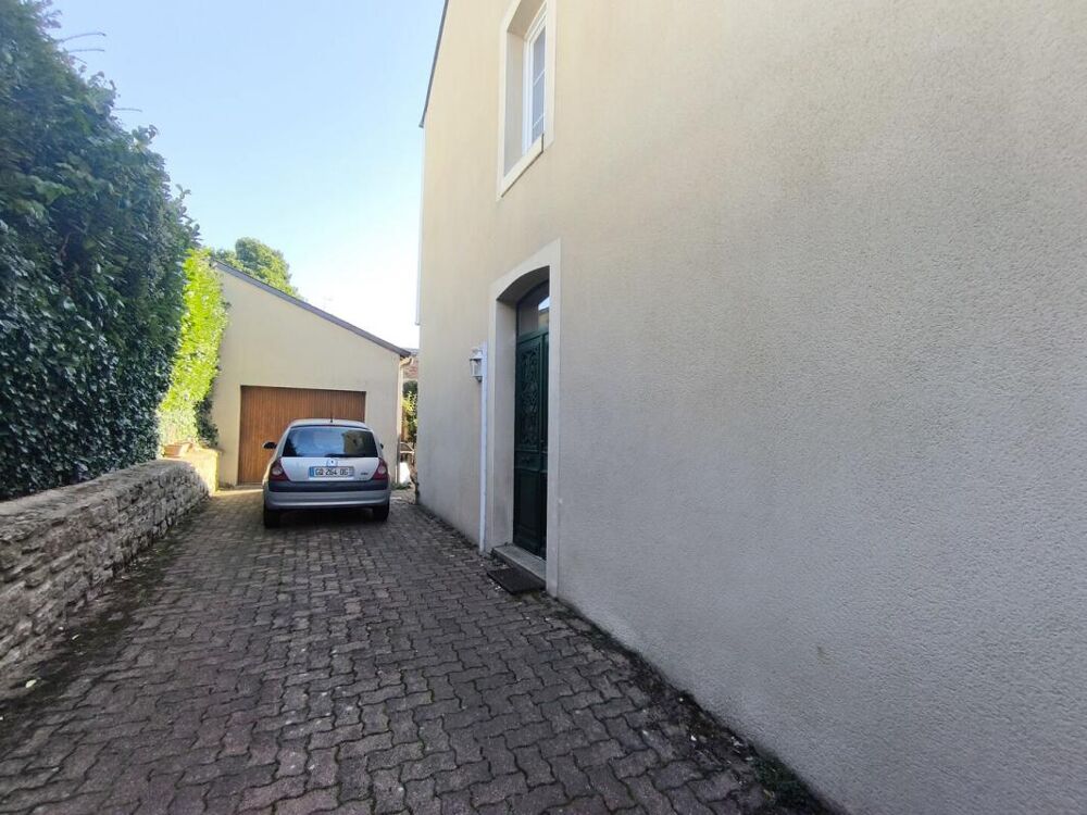 Maison centre ville avec garage et jardin