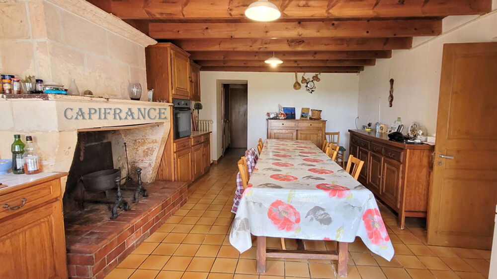 Ensemble immobilier : maison + gîte + annexe + garage, atelier et jardin clos à NIEUL LES SAINTES (17)
