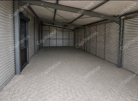   Magnifique HANGAR  de 500 m2 plus annexes avec parking béton à SOULA 