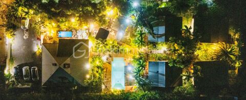 Vente Propri�t�/Ch�teau Ensemble immobilier d'exception compos� d une belle villa T4/5 et d un fonds de commerce de 4 g�tes (2 T2 avec et 2 T3) avec pis Sainte anne