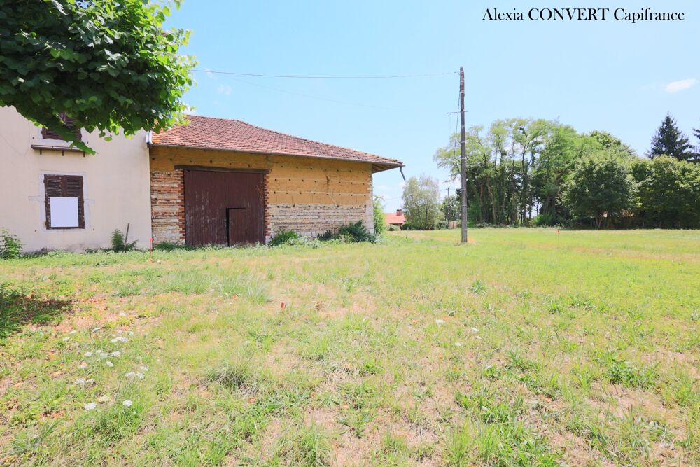 Dépendance 115m² avec 946m² de terrain proche centre village Foissiat