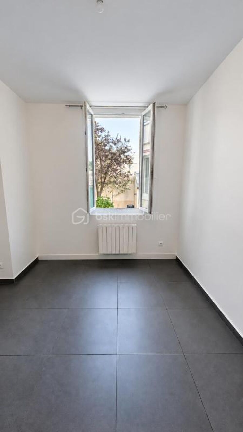 Vente Appartement LA GARENNE-COLOMBES - Studio rénové au calme, avec cave et accès au jardin La garenne colombes