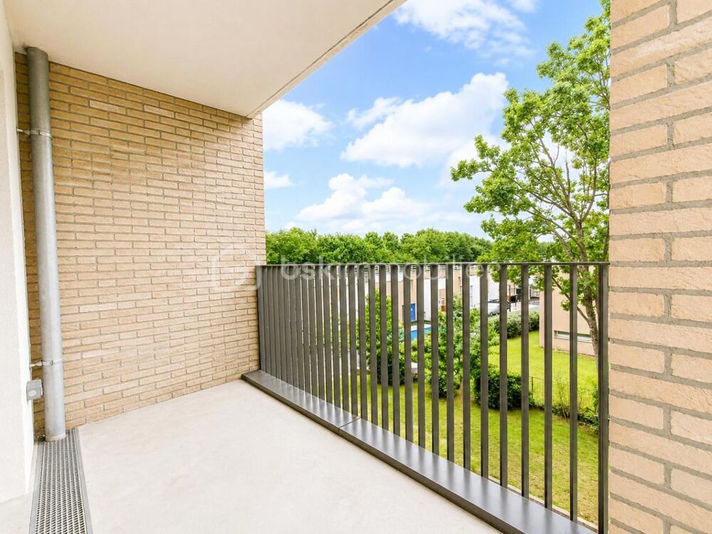 Superbe F3 avec balcon, cave et 2 parkings en sous-sol