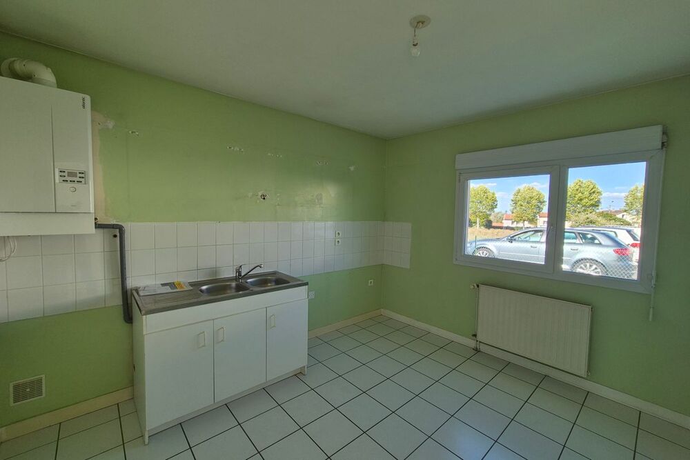 PAVILLON T4 AVEC GARAGE ET JARDIN  LEMPDES // LES AUBEPINES
