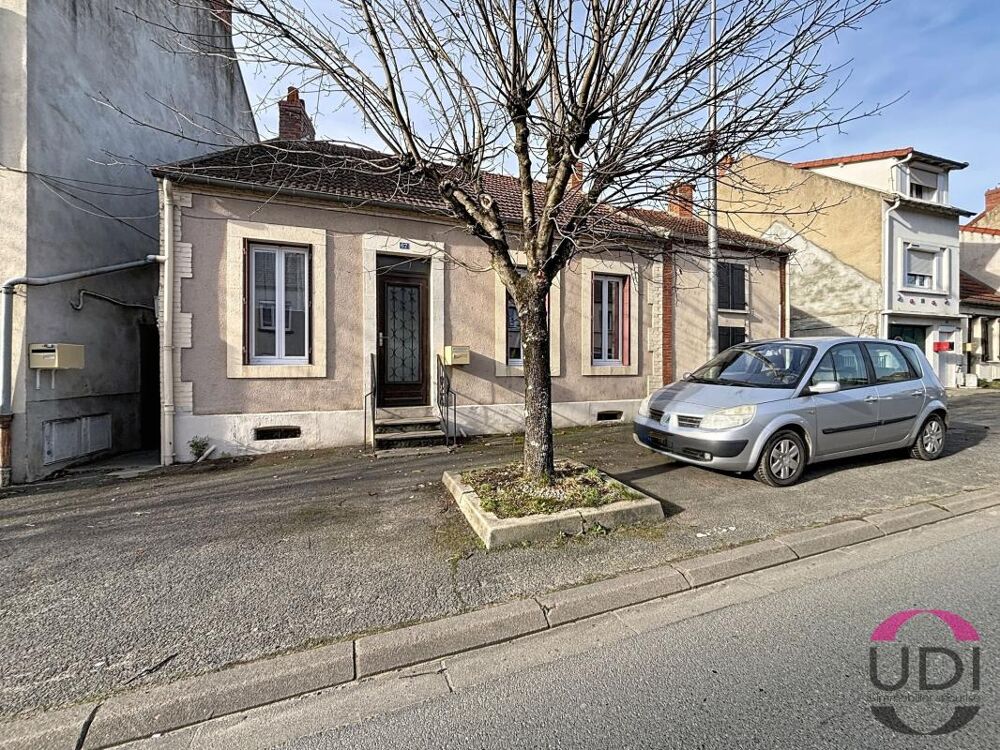 Maison de ville de 71m² avec jardin, dépendance et caves