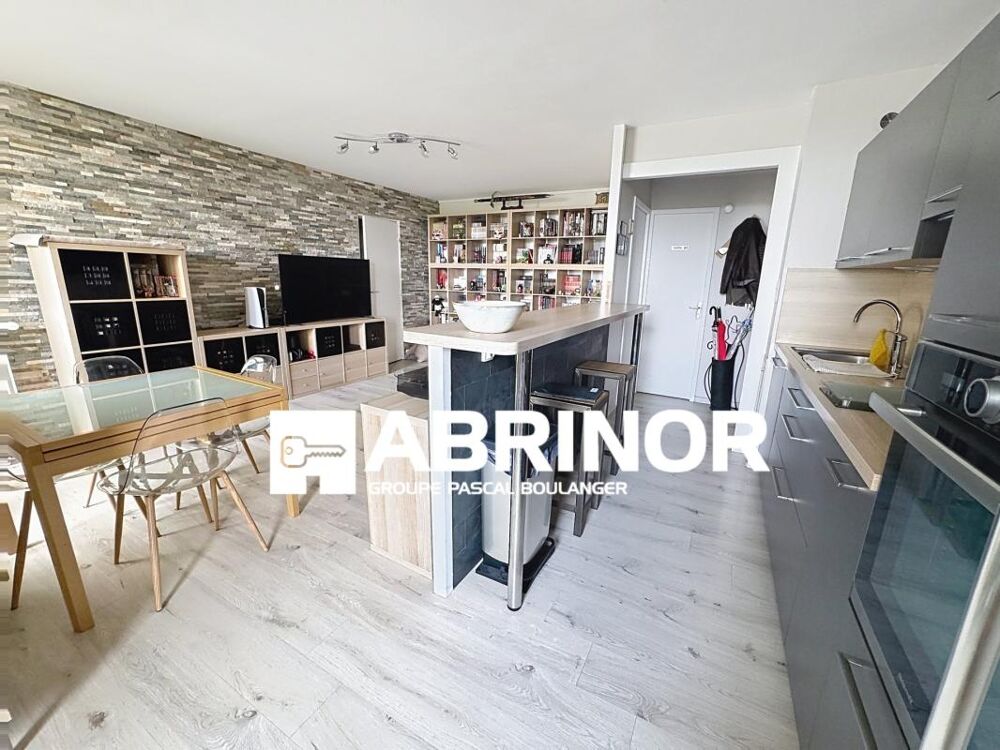 Appartement de Type 2 - balcon - cave - place de parking